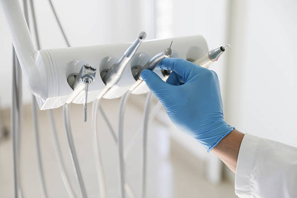 Professional Tooth Extraction technician working in Dimondale, MI